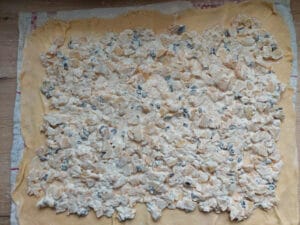 Strudel filling spread across the whole dough